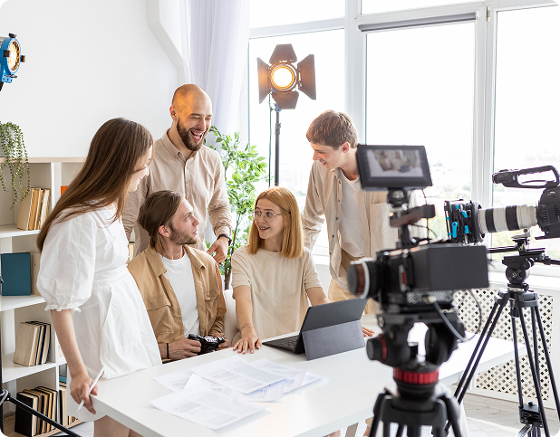 Creative team collaborating on influencer campaign production